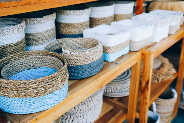 istock different handmade weaving baskets in craft shop in a row. 1468129956