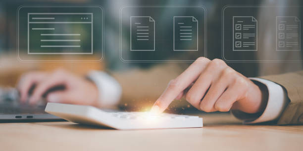 istock accountant calculating figures in company financial online documents with a calculator,analysis of company financial data,Planning to assess and review budgets,concept of finance and investment 1468130931