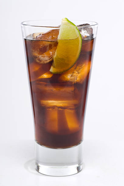 istock glass of cola with ice and lime 146813309