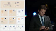 istock LD Caucasian business man standing outside at night and using the home control app on his smartphone 1468135871