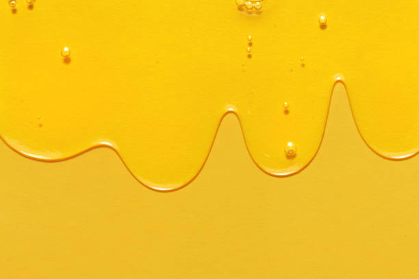Cosmetic serum gel beauty on yellow background. Skincare beauty product with bubbles texture stock photo