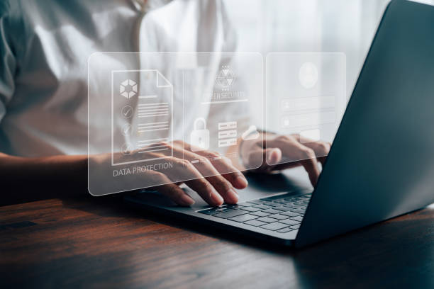 istock Businessmen protecting personal data on laptop and virtual interfaces. 1468142602