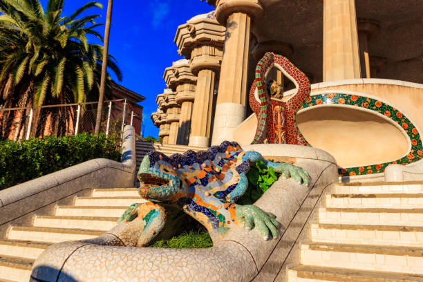Multicolored mosaic dragon salamander of Gaudi in Park Guell, Barcelona, Spain stock photo
