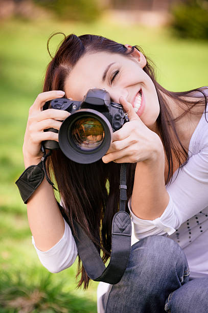 istock Beautiful girl with camera 146815131