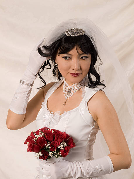 PVC Asian Bride, looking to her right stock photo