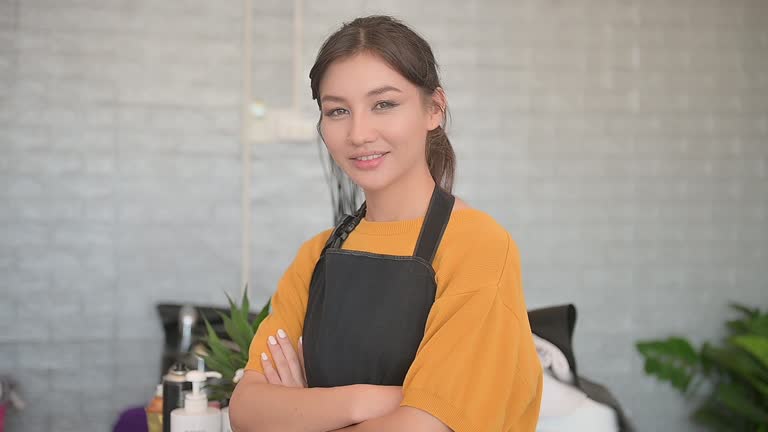 Portrait of woman hair salon business owner