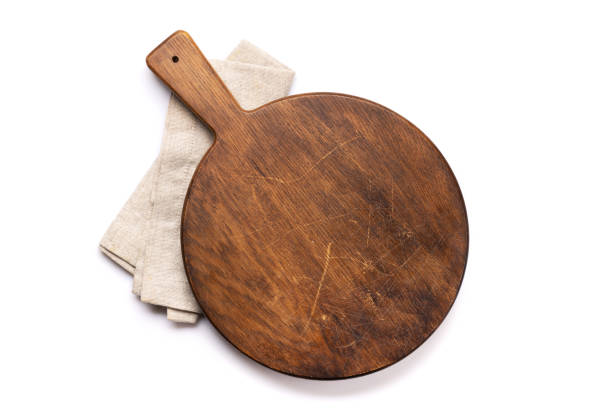 Wooden cutting board and kitchen towel