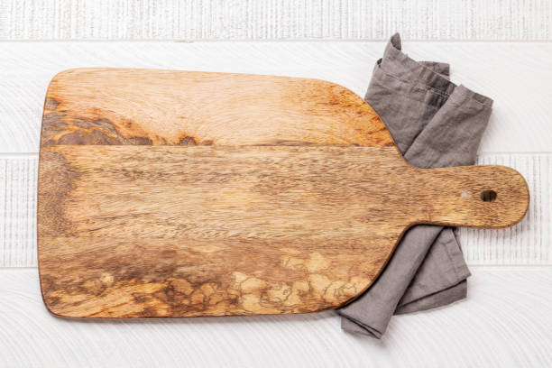 istock Wooden cutting board and kitchen towel 1468155089