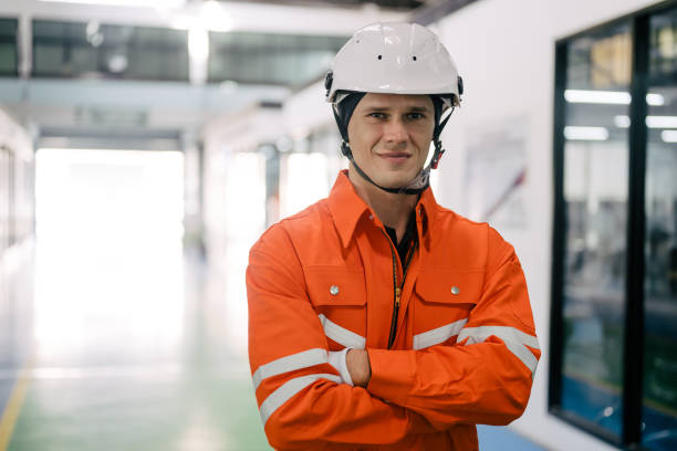 istock Portrait of professional technician engineer smiling and looking at camera 1468156046