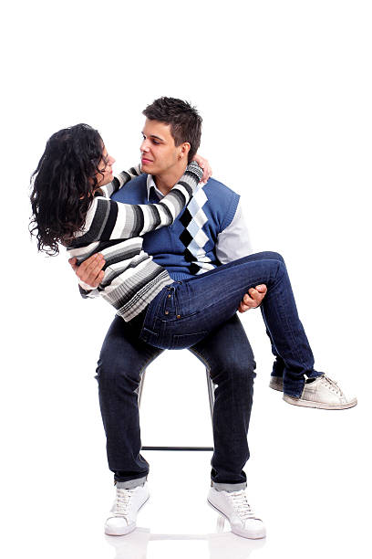 istock young couple sitting on a chair 146816123