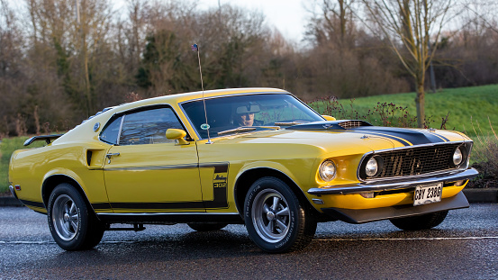 Stony Stratford, Bucks, UK, Jan 1st 2023. 1969 yellow classic Ford Mustang American car