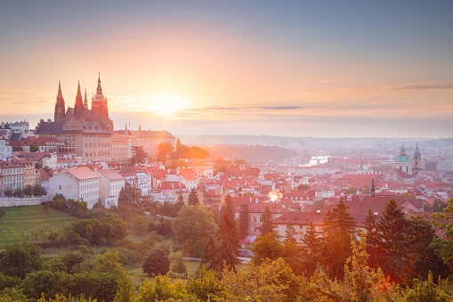 Cityscape image of Prague, capital city of Czech Republic with St. Vitus Cathedral during summer sunrise.