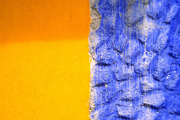 Blue and yellow wall in Mexico stock photo