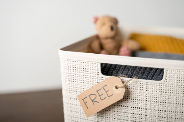 istock Box with clothing and toy to donate 1468165827