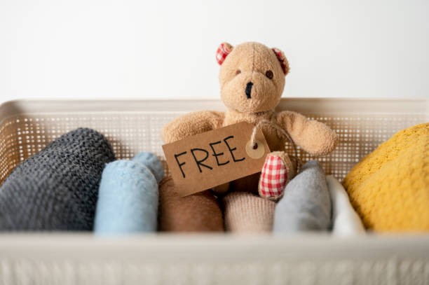istock Box with clothing and toy to donate 1468165877
