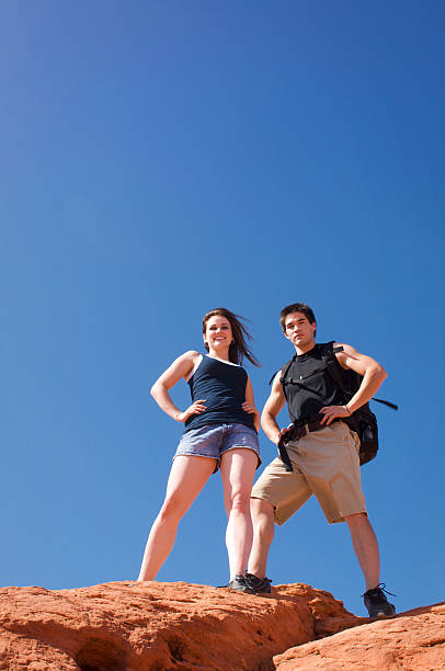 Young couple hiking stock photo