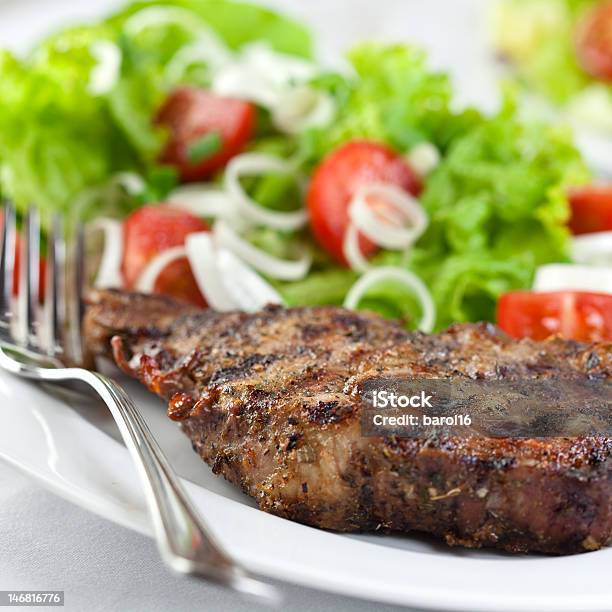 Grilled Pork With Herbs And Salad Stock Photo - Download Image Now - Close-up, Cutlet, Dinner
