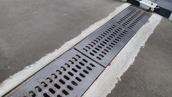 culvert cover made of thick steel. the point is that the manhole can be passed by vehicles