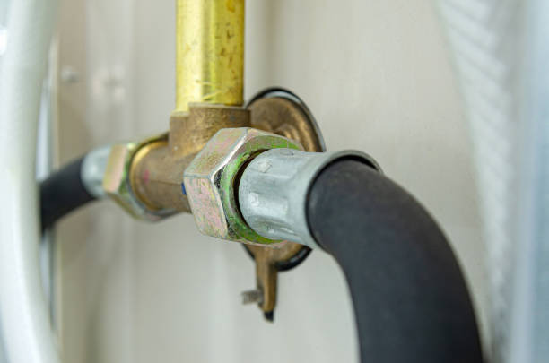 istock Connection of elastic water hoses in the shower. 1468170709