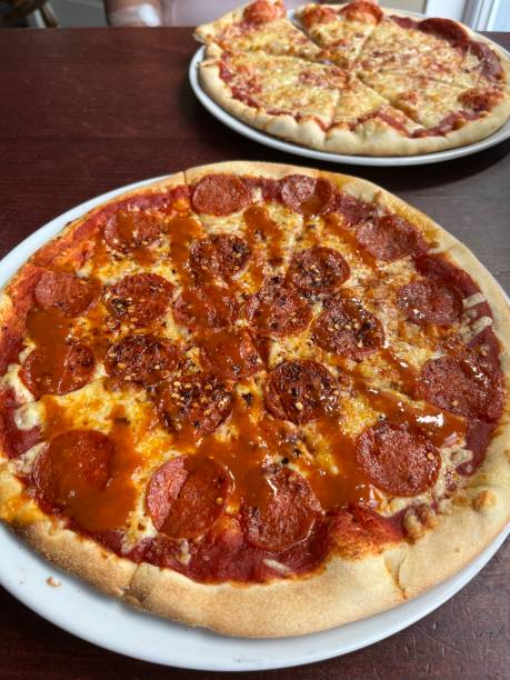 istock Delicious freshly made pizza at a restaurant 1468172626