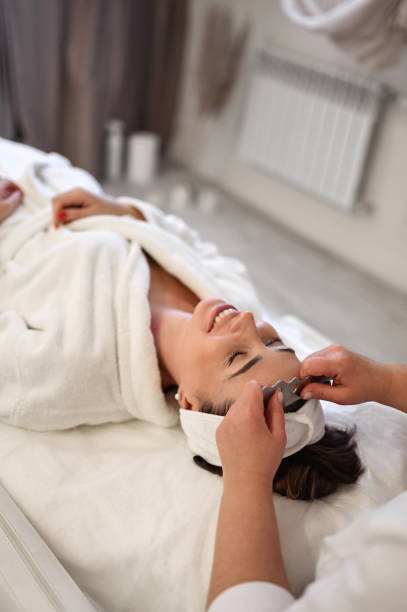 istock Chinese traditional massage - Gua Sha with stone. 1468173721