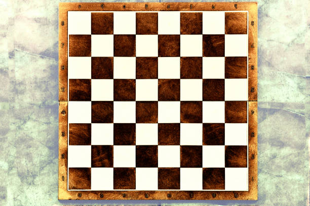 istock Brown chessboard on fray surface for text and advertising 1468173944