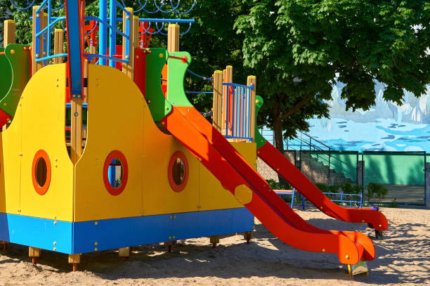 istock Summer spring children's playground with painted toy ship in park 1468174437