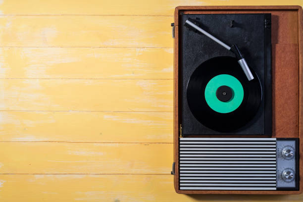 istock Nice vintage record player with a vinyl record view from above 1468174846