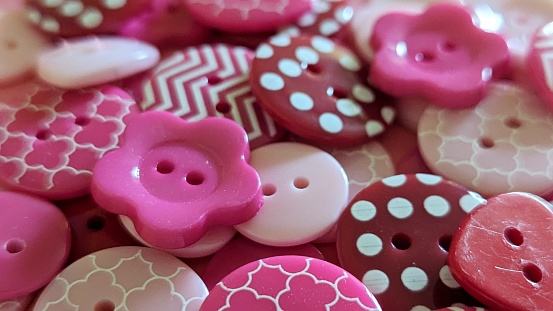 Pink buttons in close up