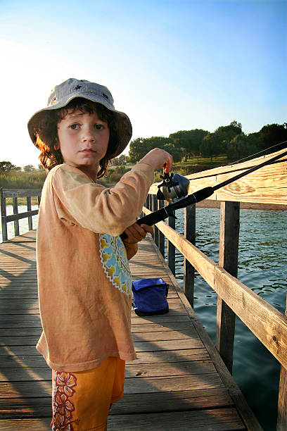 istock Boy Fishing on Pier 146817771