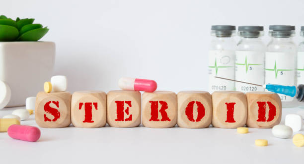 istock Word STEROID made from wooden letters on grey backgound. Plant on backgound. 1468177965