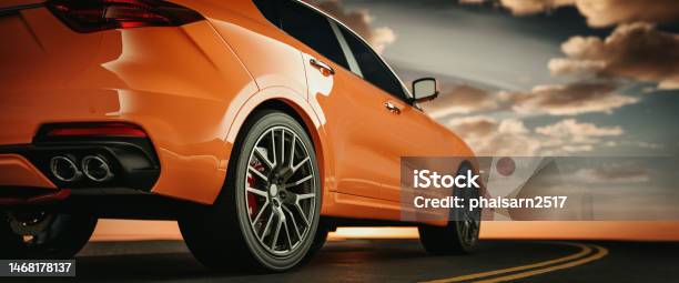 Closeup Side View Of An Orange Luxury Sports Car Stock Photo - Download Image Now - Car, New, Road