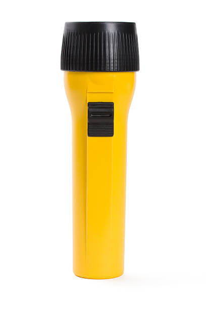 Flashlight Close up of yellow flashlight isolated on white. electric torch stock pictures, royalty-free photos & images