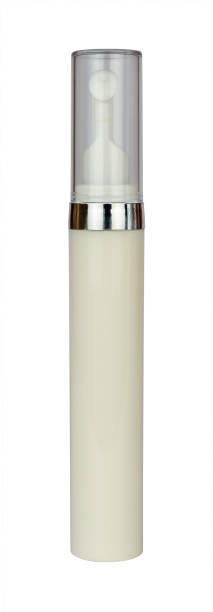 istock Container of a face serum with an applicator on white 1468180495