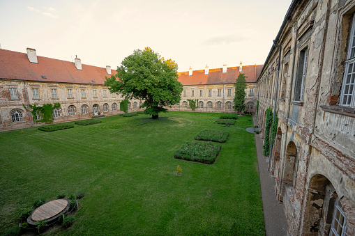 Courtyard with peacocks of Benedictine monastery in Rajhrad\n, Czech Republic.