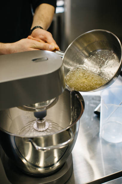istock The chef works with a dough mixer. Adding caramel, close-up. 1468183880