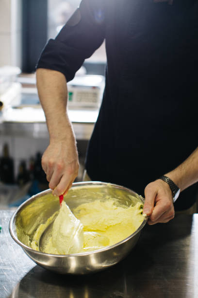 istock The chef works in the kitchen. The process of making dough for macaroons. 1468184162