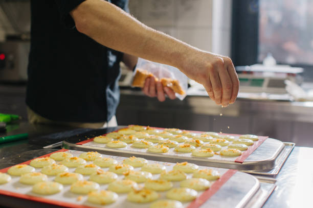 istock A confectioner makes macaroons in a pastry shop. 1468184784