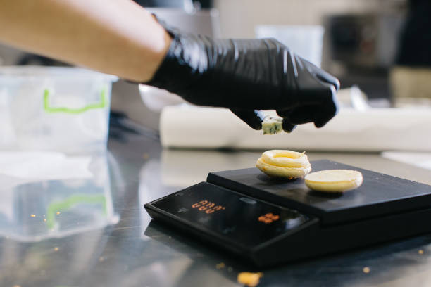 istock A confectioner makes macaroons in a pastry shop. 1468184857