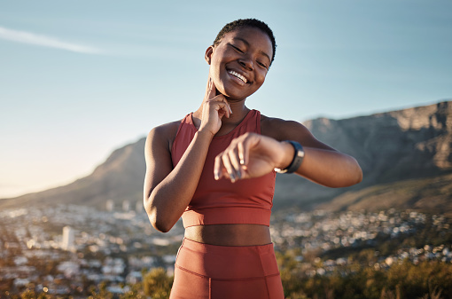 Black woman, fitness or smart watch for pulse check in nature workout, training or sunset exercise for cardiovascular healthcare. Smile, happy or sports runner with heart rate clock for body wellness