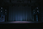 music stage theater concert with backdrop illuminated with stage light
