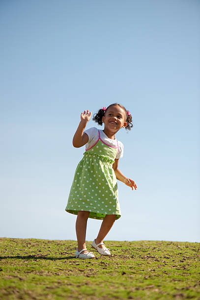 Little Girl Waving stock photo