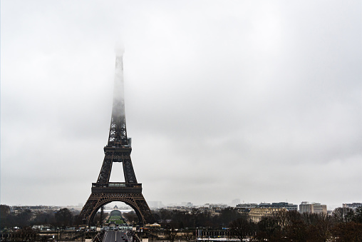 Eiffel tower under clouds