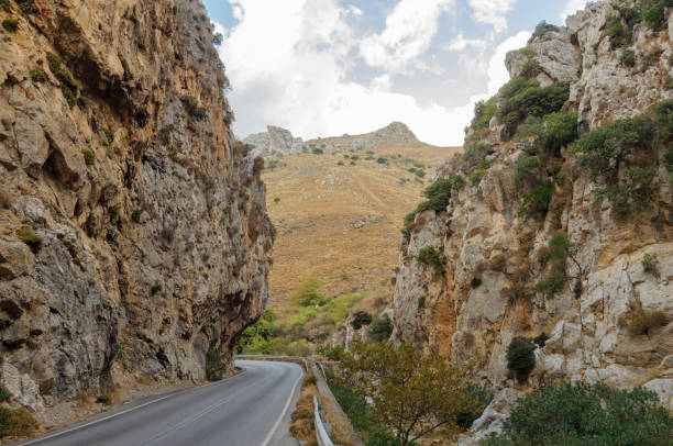 istock Continuous line on road. Road in mountain. The journey continues 1468187366