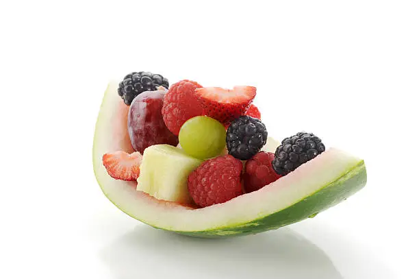 Close-up image of a fruit salad studio isolated on white background