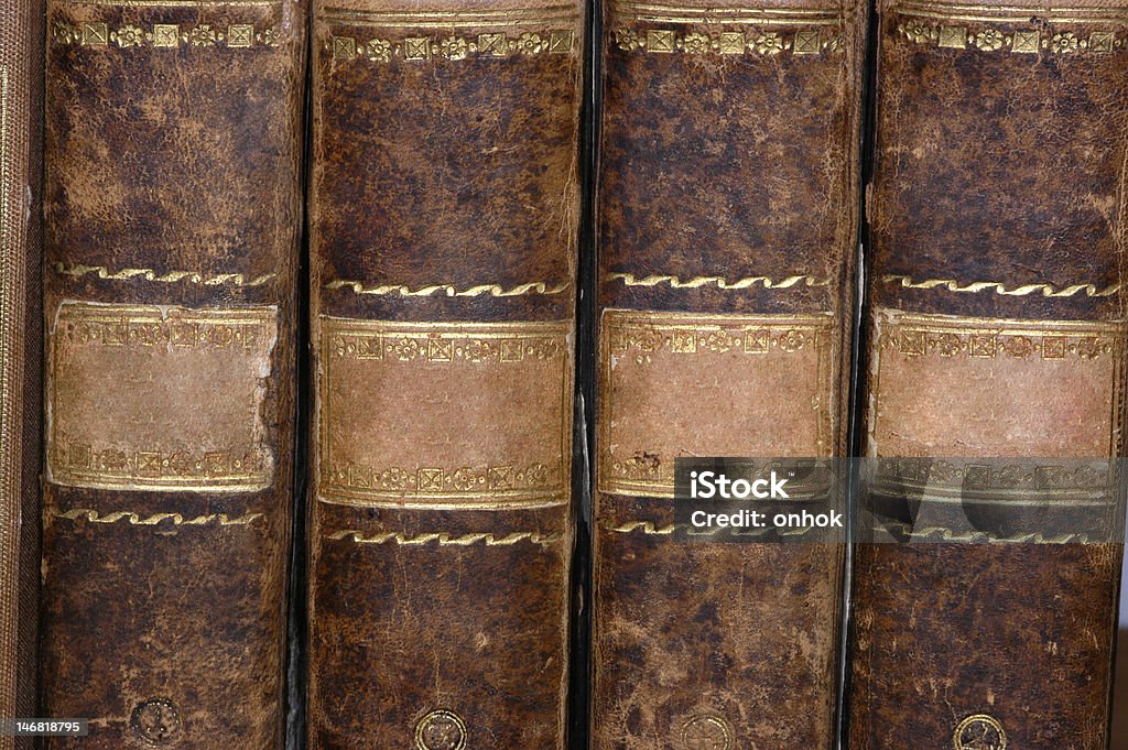 old books Detailed view of old leather-bound BAcher Antique Stock Photo