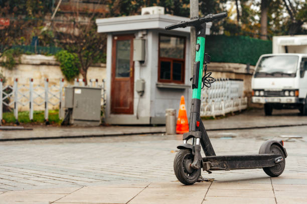 istock Modern electric scooter parked on the street 1468189015