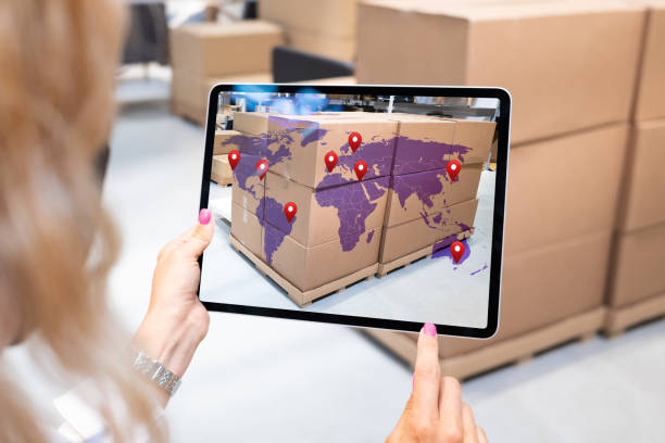istock Worker in a logistics warehouse processing orders and packages for transport and international shipping 1468192812