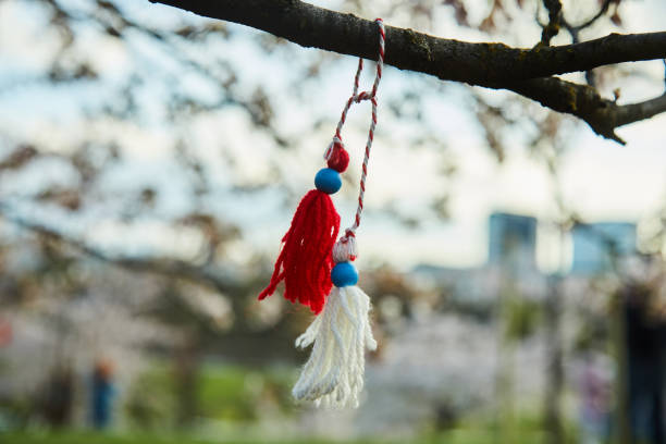 istock Bulgarian traditional spring decor martenitsa on the blossom tree. Baba Marta holiday. 1468195042