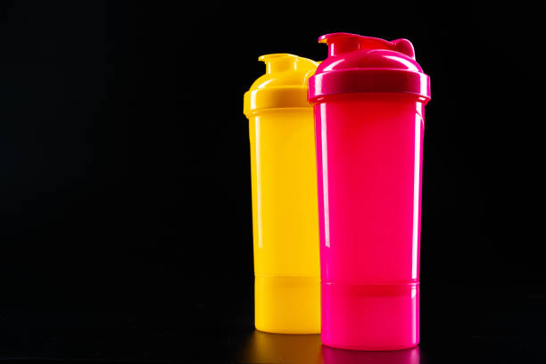 istock Sport bottle for drink on black background 1468195273